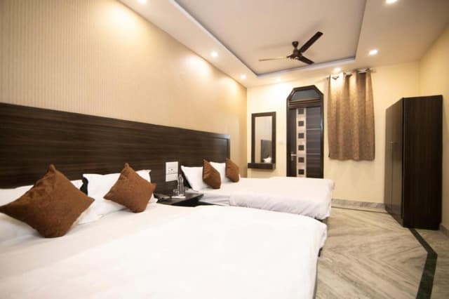 Triple Bed Room With Air Conditioning
