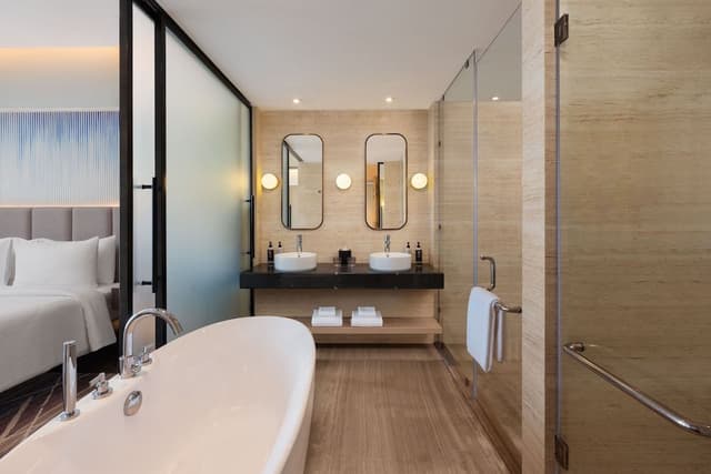 Junior Suite with King bed, city view, 15% F&B discount, 4 pieces laundry