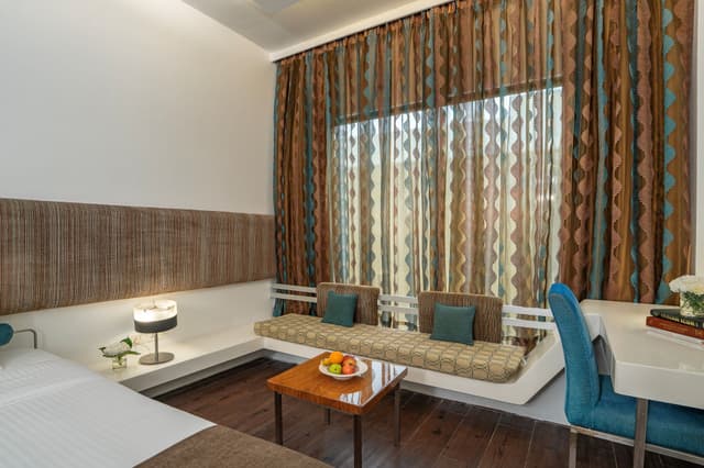 Premium Room with Airport Transfers - SGL