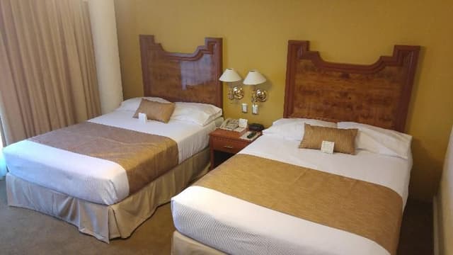 DOUBLE TWO DOUBLE BEDS