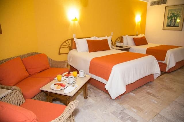 JUNIOR SUITE OCEAN VIEW TWO DOUBLE BEDS