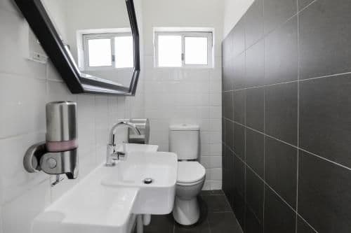 Budget Family Room with Shared Bathroom