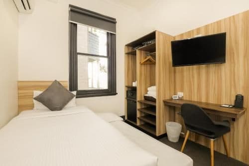 Budget Family Room with Shared Bathroom