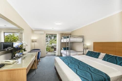 Standard Room with 1 King and 3 Single Beds
