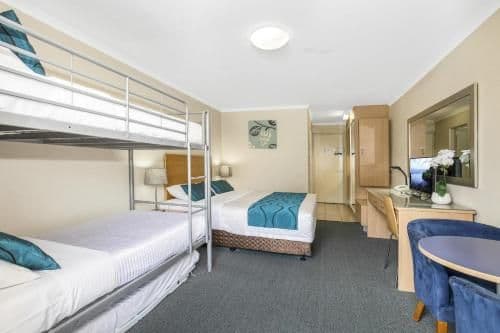 Standard Room with 1 King and 3 Single Beds