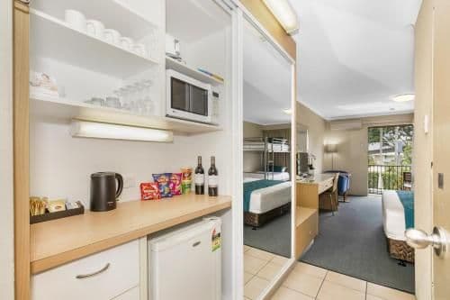 Standard Room with 1 King and 3 Single Beds