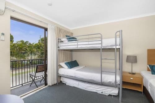 Standard Room with 1 King and 3 Single Beds