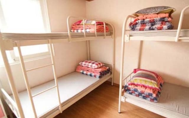 Bed in dormitory FEMALE ROOM