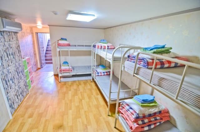 Bed in dormitory WITH SHARED BATHROOM