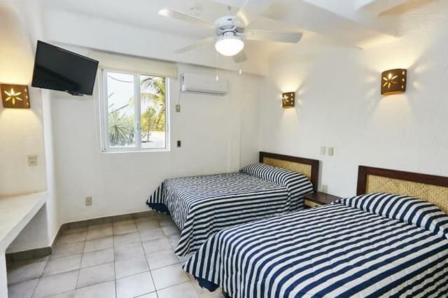 FAMILY ROOM EXECUTIVE THREE BEDROOMS
