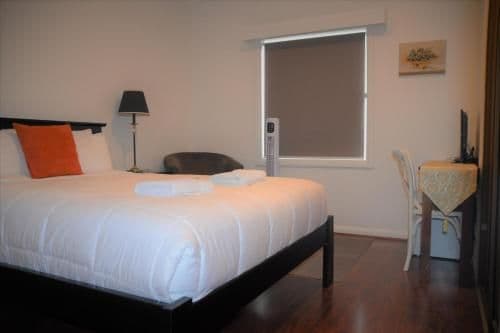 Queen Room with Shared Bathroom