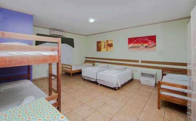 Bed in dormitory WITH SHARED BATHROOM