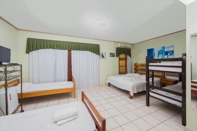Bed in dormitory WITH SHARED BATHROOM