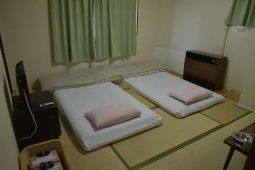 Standard Twin Room with Shared Bathroom - Non-Smoking
