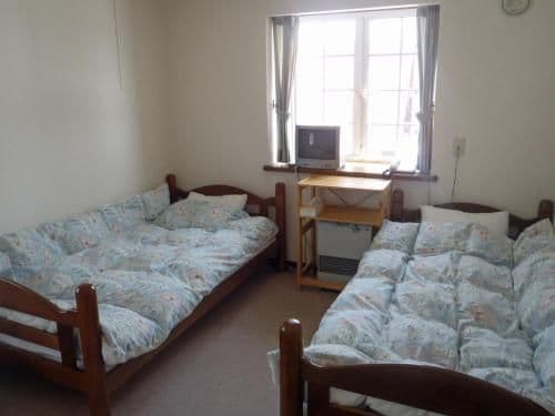 Quadruple Room with Shared Bathroom