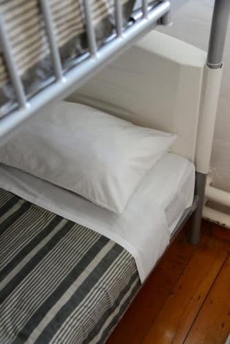 Single Bed in Female Dormitory Room