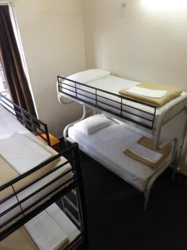 Bed in 4-Bed Female Dormitory Room with Shared Bathroom
