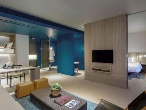 Family Pool Suite With A King Bed A Bunk Bed And Garden View