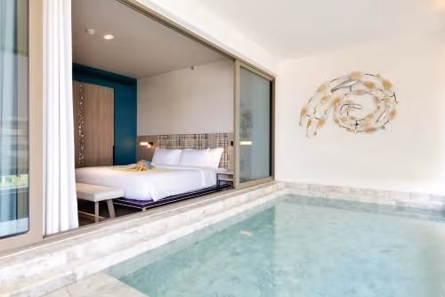 Family Pool Suite With A King Bed A Bunk Bed And Garden View