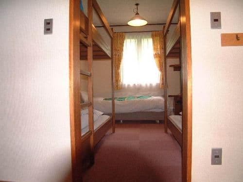 Room with Bunk Beds and Shared Bathroom