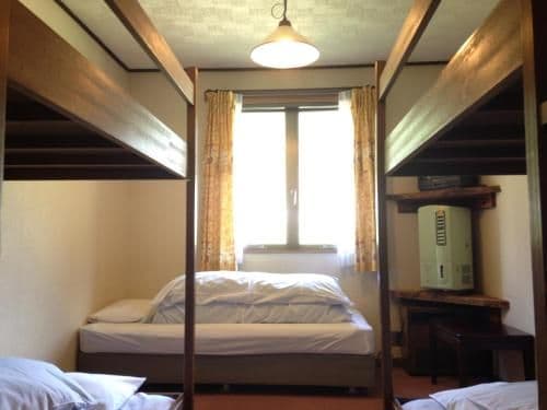Room with Bunk Beds and Shared Bathroom
