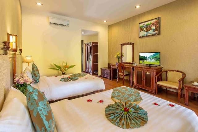 TWIN GRAND DELUXE