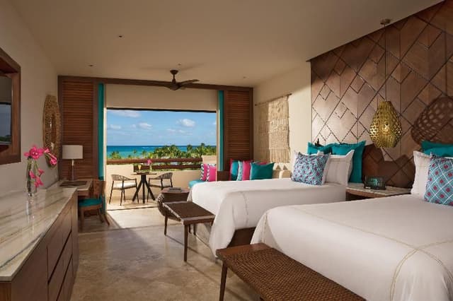 JUNIOR SUITE OCEAN VIEW TWO DOUBLE BEDS