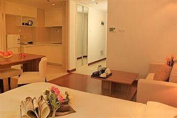 Tujia SweetomeVacation Rental Qingdao Damuzhi Finance Square1