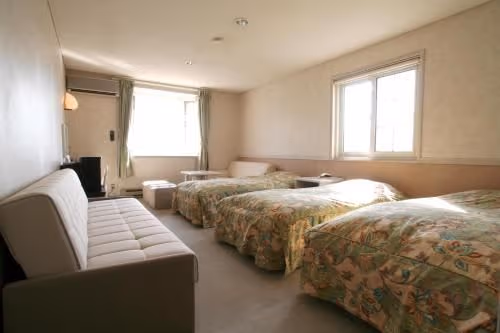 Quadruple Room with Shared Bathroom