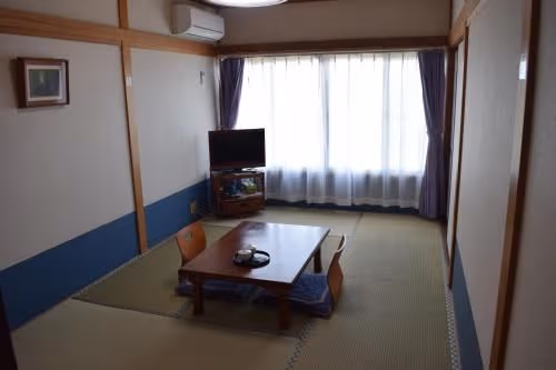 Japanese-Style Family Room with Shared Bathroom