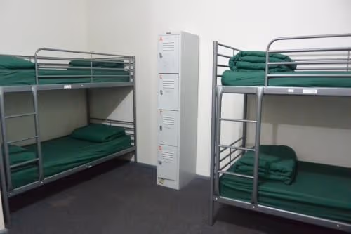 Bed in 8-Bed Female Dormitory Room with Shared Bathroom