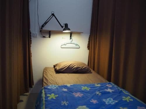 Single Bed in Dormitory Room