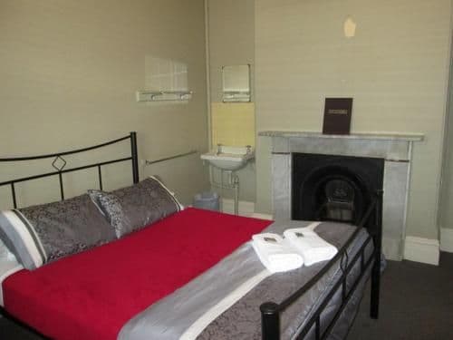 Queen Room with Shared Bathroom