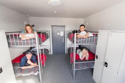 Bed in 4-Bed Dormitory Room with Shared Bathroom