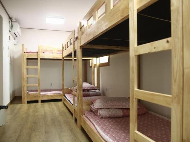 Bed in dormitory MALE ROOM