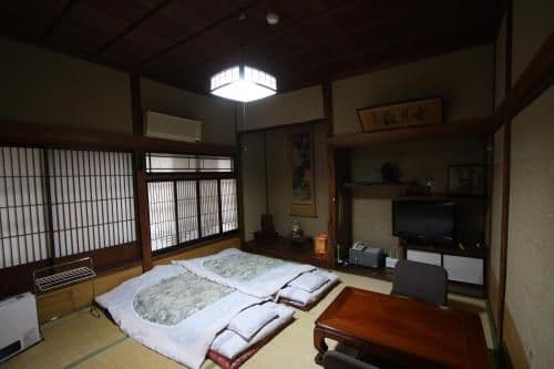 Japanese-Style Family Room with Shared Bathroom