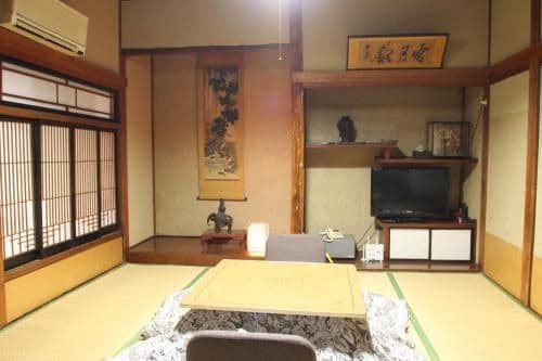 Japanese-Style Family Room with Shared Bathroom