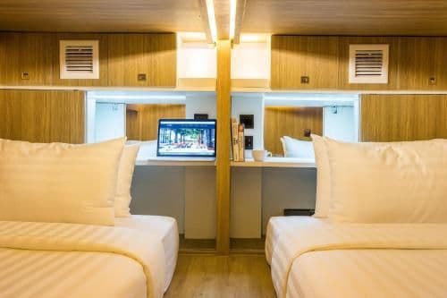 Twin Capsule Suite with Shared Bathroom