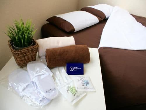 Twin Room with Two Double Beds and Shared Bathroom