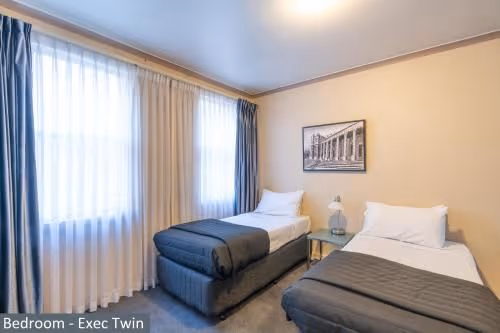 Executive Two Bedroom Apartment with Queen Bed and 2 Single Beds