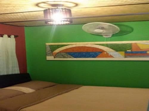 Double Bed in Mixed Dormitory Room with Fan and Shared Bathroom