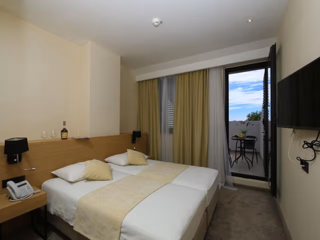 JUNIOR SUITE SIDE SEA VIEW WITH BALCONY