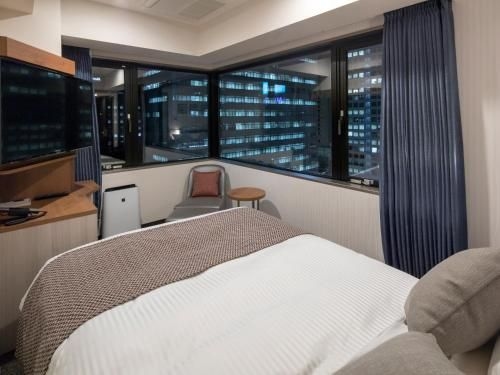 โรงแรมมายสเตย์ มิโดะสุจิ ฮมมะชิ (HOTEL MYSTAYS Midosuji Honmachi)0