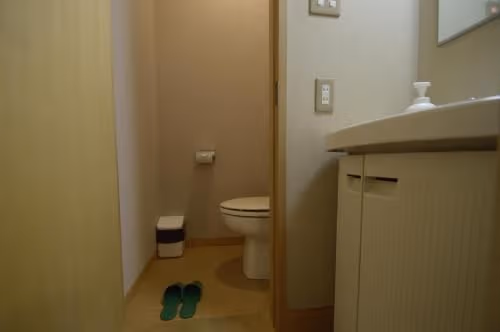 Japanese-Style Family Room with Shared Bathroom