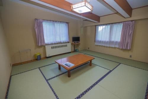 Japanese-Style Family Room with Shared Toilet