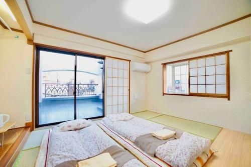 浅草寺3分、スカイツリーが真正面から見える大きなバルコニー付きの和室6F (Senso-ji 3 minutes, Japanese-style room 6F with large balcony overlooking Sky Tree)0