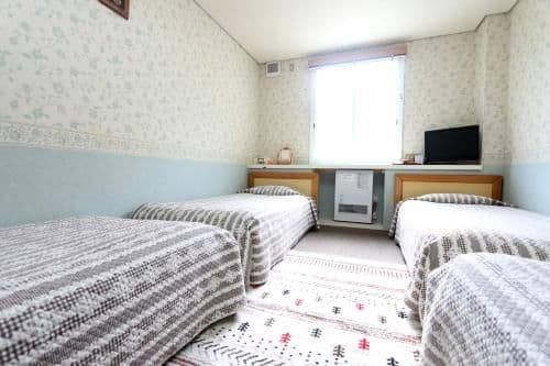 Quadruple Room with Shared Bathroom