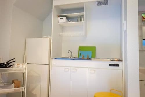 Economy Upper Bunk Bed in Female Dormitory Room