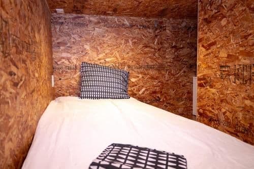 Economy Upper Bunk Bed in Female Dormitory Room
