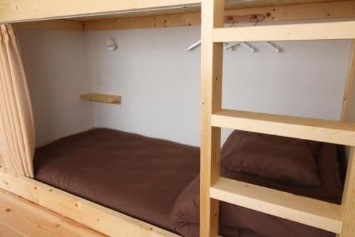 Bunk Bed in Female Dormitory Room with Shared Bathroom